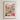 The image is a framed poster depicting a vibrant and colorful flower market scene.