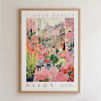 The image is a framed poster depicting a vibrant and colorful flower market scene.
