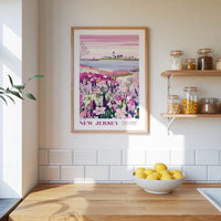 a kitchen scene with a framed poster of a field of flowers hanging on the wall, a wooden counter with a bowl of lemons, and shelves displaying various jars and containers.