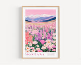 A framed poster depicting a vibrant field of flowers with mountains in the background, showcasing the state flower of Montana.