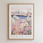 The image is a framed poster depicting a cityscape with a flower market in the foreground.