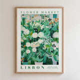 The image is a framed poster depicting a vibrant and lush flower market in Lisbon, Portugal.
