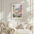a framed poster of a flower market in Greenwich, with a colorful and vibrant illustration of flowers and plants.