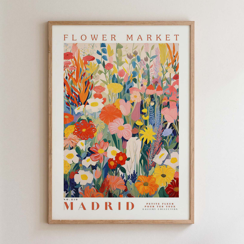 The image is a framed poster of a vibrant and colorful floral arrangement, depicting various flowers and plants in a lively and dynamic composition.
