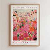 The image is a framed poster depicting a vibrant and colorful flower market in Valletta, Malta.