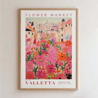 The image is a framed poster depicting a vibrant and colorful flower market in Valletta, Malta.