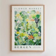 The image is a framed poster depicting a vibrant and colorful floral scene, with various types of flowers and plants arranged in a lush, natural setting.