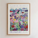 The image is a framed poster depicting a vibrant and colorful flower market in Frankfurt, Germany.