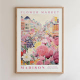 The image is a framed poster depicting a vibrant and colorful flower market in Madison, Wisconsin.