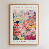 The image is a framed poster depicting a vibrant and colorful flower market in the city of San Francisco, California.