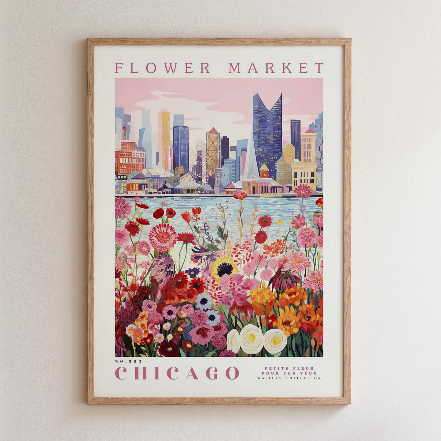 The image is a framed poster depicting a cityscape with a variety of colorful flowers in the foreground, set against a pink and blue sky.