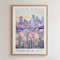 The image is a framed poster depicting a cityscape with a field of flowers in the foreground.