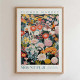 The image is a framed poster of a vibrant and colorful floral arrangement, with various flowers and plants depicted in a detailed and artistic manner.
