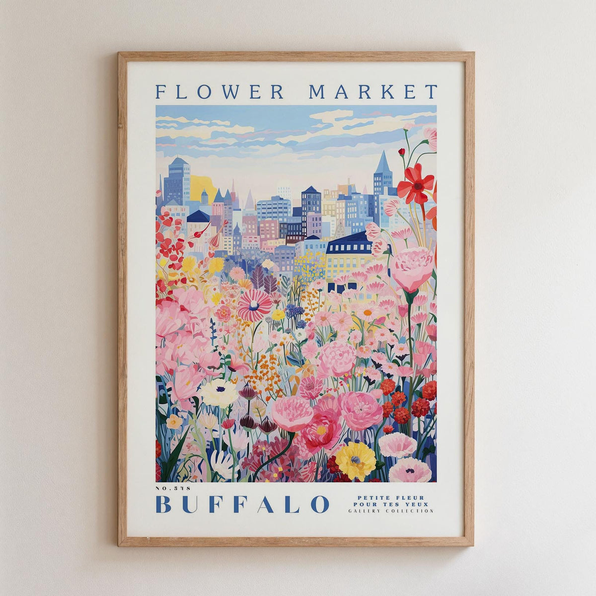 A framed poster depicting a vibrant cityscape with a colorful flower garden in the foreground.