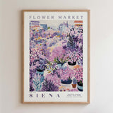 The image is a framed poster depicting a vibrant and colorful flower market scene.