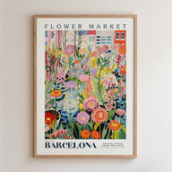 The image is a framed poster depicting a vibrant and colorful garden scene with various flowers and plants.