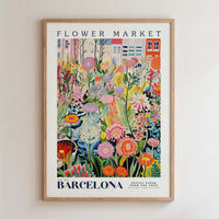 The image is a framed poster depicting a vibrant and colorful garden scene with various flowers and plants.