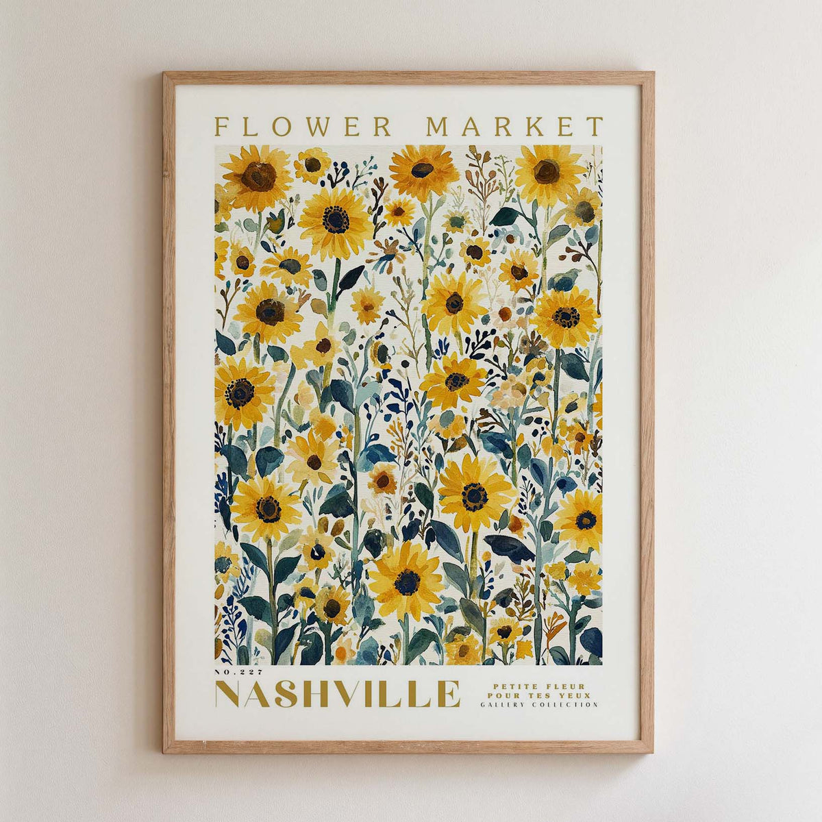 The image is a framed poster of a field of yellow sunflowers, with the text "FLOWER MARKET" and "NASHVILLE" printed on it.