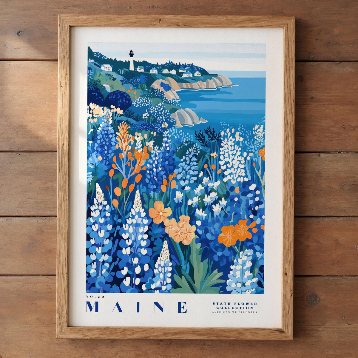 A framed illustration of a coastal landscape with a lighthouse, featuring a variety of colorful flowers and plants in the foreground.