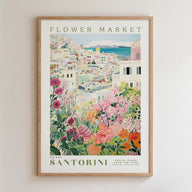 The image is a framed poster depicting a colorful and vibrant flower market in Santorini, Greece.