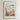 The image is a framed poster depicting a colorful and vibrant flower market in Santorini, Greece.