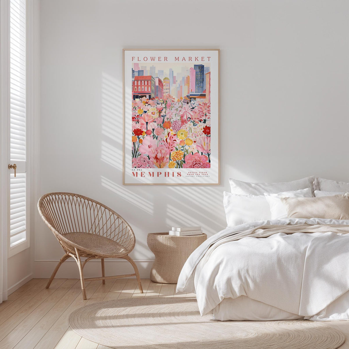 a bedroom with a bed, a woven chair, and a framed poster of a flower market in Memphis, Tennessee.