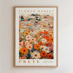 The image is a framed poster depicting a vibrant and colorful flower market in Crete, Greece.