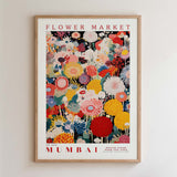 The image is a framed poster of a colorful floral arrangement, depicting various flowers and plants.