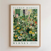 The image is a framed poster depicting a vibrant and colorful flower market in Sydney, Australia.