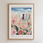 The image is a framed poster depicting a cityscape with a flower market in the background.
