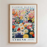 The image is a framed poster depicting a vibrant and colorful flower market in Athens, Greece.
