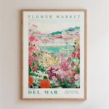 The image is a framed poster depicting a vibrant and colorful flower market in Del Mar, California.