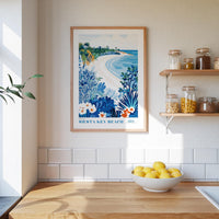 a framed poster of a beach scene with a wooden shelf below it, containing various jars and bottles. A bowl of lemons is placed on a wooden countertop, and the wall behind the countertop has white tiles.