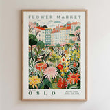 The image is a framed poster depicting a vibrant and colorful flower market in Oslo, Norway.