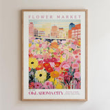 The image is a framed poster depicting a vibrant and colorful flower market in Oklahoma City.