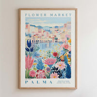 The image is a framed poster depicting a colorful and vibrant scene of a flower market in Palma, Spain.