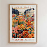 The image is a framed poster depicting a vibrant flower market in Paris, France.