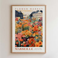 The image is a framed poster depicting a vibrant flower market in Paris, France.