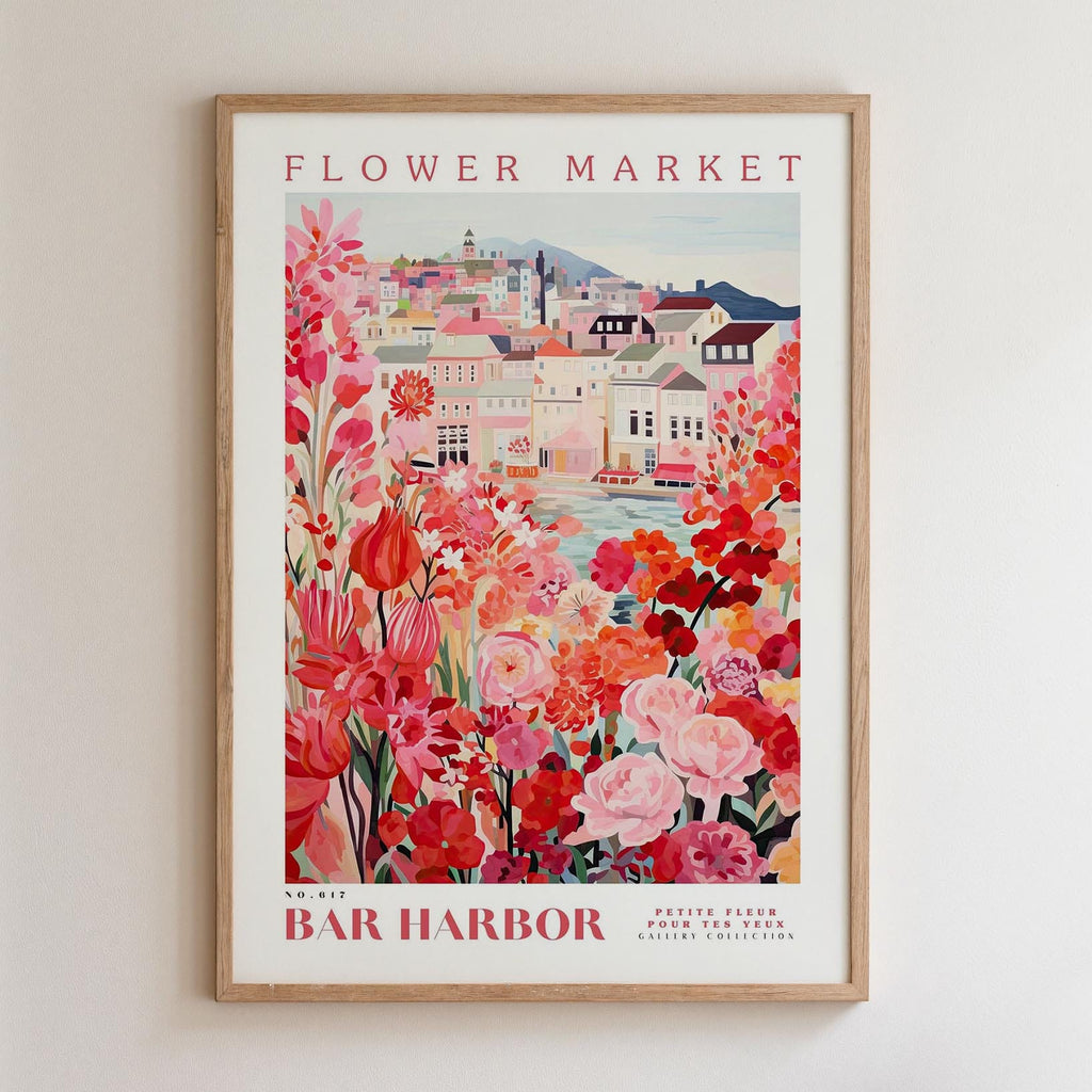 The image is a framed poster depicting a vibrant and colorful scene of a flower market in a town, with buildings, flowers, and a river in the background.