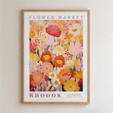 The image is a framed poster of a vibrant floral arrangement, featuring a variety of colorful flowers and plants.