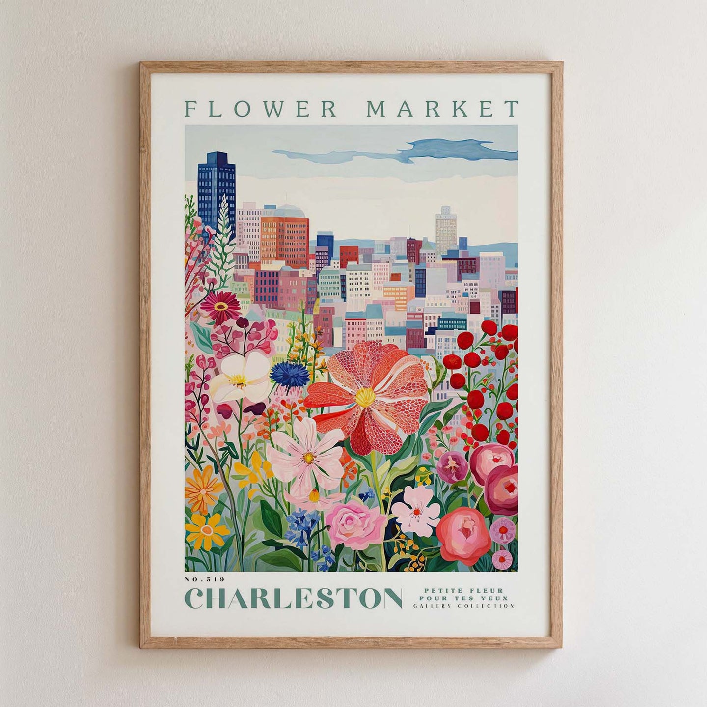 The image is a framed poster depicting a cityscape with a variety of colorful flowers in the foreground.