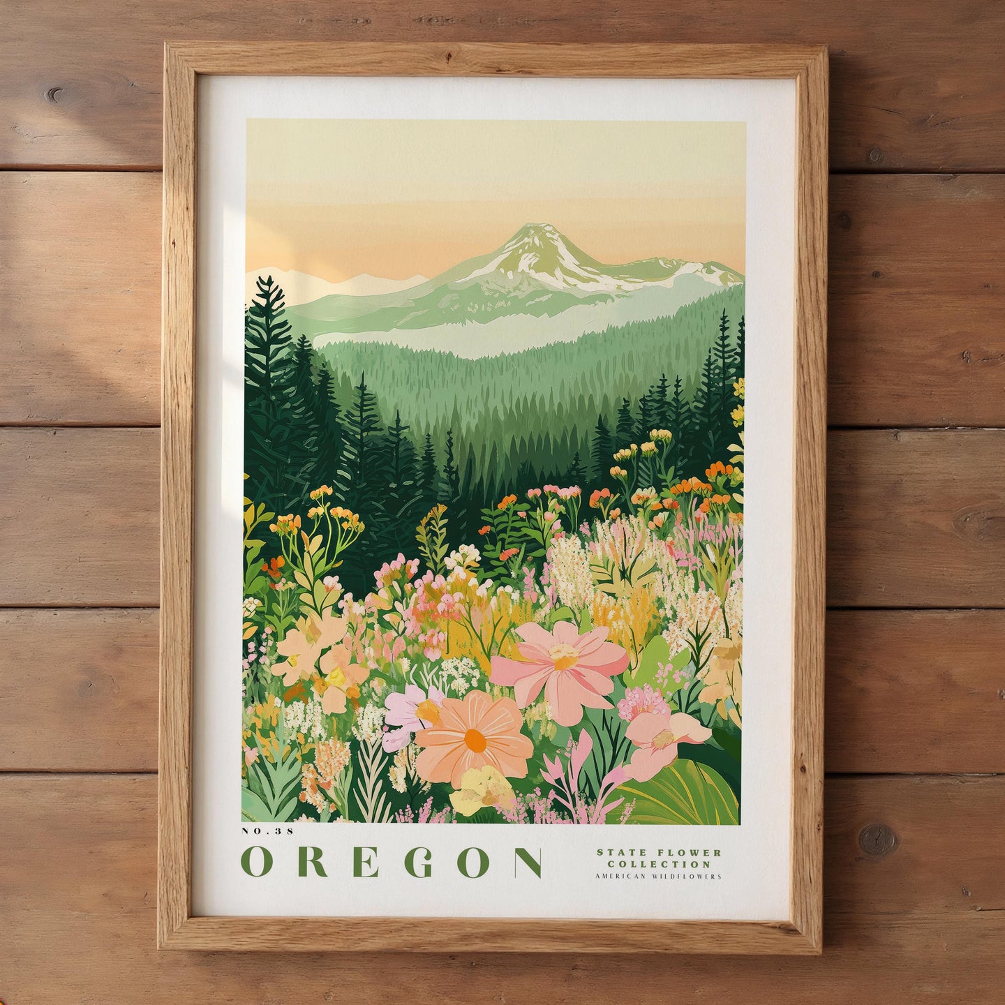 The image is a framed poster depicting a scenic landscape with a mountain in the background, a forest, and a field of colorful wildflowers in the foreground.