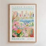 The image is a framed poster depicting a cityscape with a flower market in the foreground.