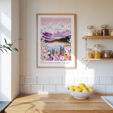 a kitchen counter with a bowl of lemons, a framed poster of Rocky Mountains, and a shelf with jars and bottles.