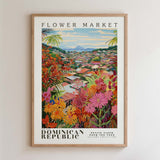 The image is a framed poster depicting a vibrant and colorful scene of a flower market in the Dominican Republic.
