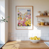 a kitchen scene with a framed poster of a flower market on the wall, a wooden counter with a bowl of lemons, and shelves displaying various jars and containers.