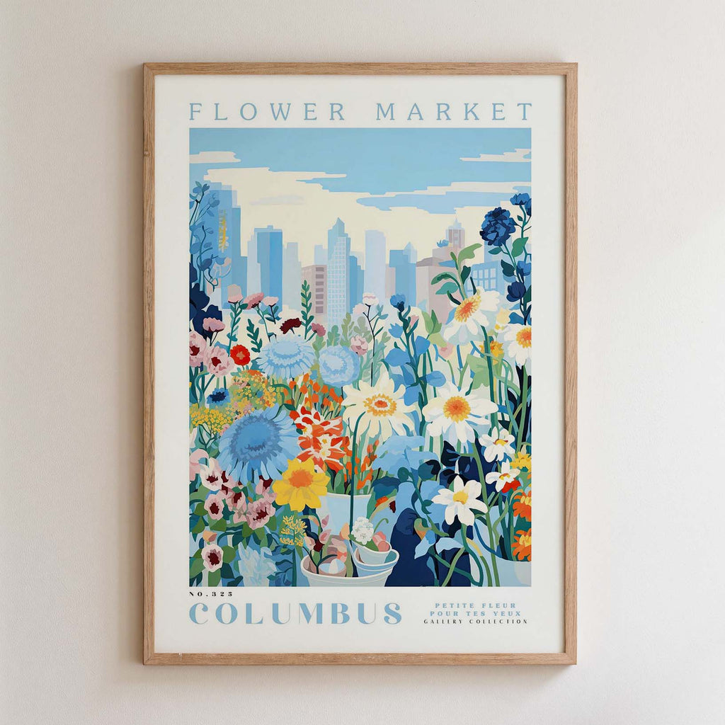 The image is a framed poster depicting a vibrant and colorful flower market in New York City, with a cityscape in the background.