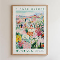 The image is a framed poster depicting a vibrant and colorful flower market in Montauk, New York.