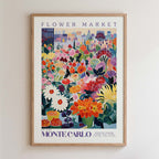 The image is a framed poster depicting a vibrant and colorful flower market in the city of Monte Carlo, France.