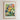 The image is a framed poster of a vibrant and colorful floral arrangement, depicting various flowers and plants in a lush, natural setting.